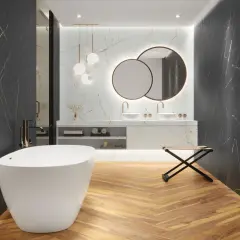 Elegancka łazienka z wanną wolnostojącą i podwójną umywalką. Ściany zdobi efektowny czarny marmur z żyłkami.